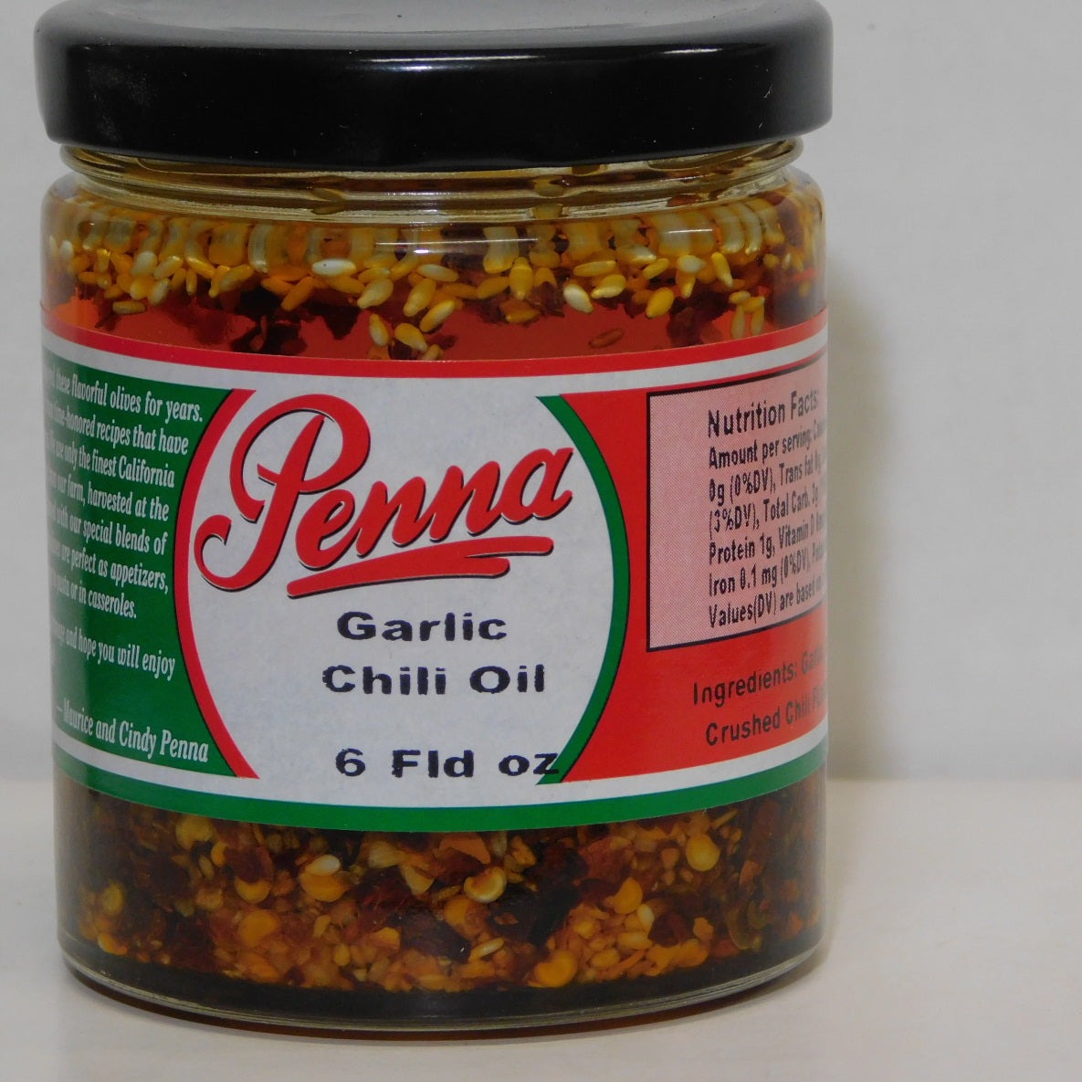 Garlic chilli oil in a small bottle with Penna branding