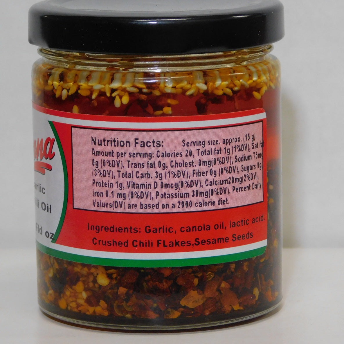 Garlic chilli oil in a small bottle with nutritional facts mentioned on it